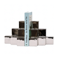 SUJETA LIBROS CUBOS